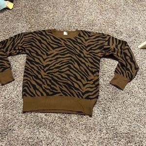 It’s a cute sweater that was never worn and very comfortable.